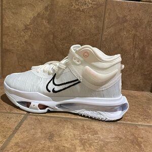 Nike basketball/volleyball shoes.  Ever worn.